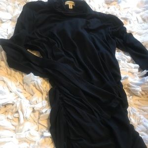 MaxStudios turtleneck shirt.